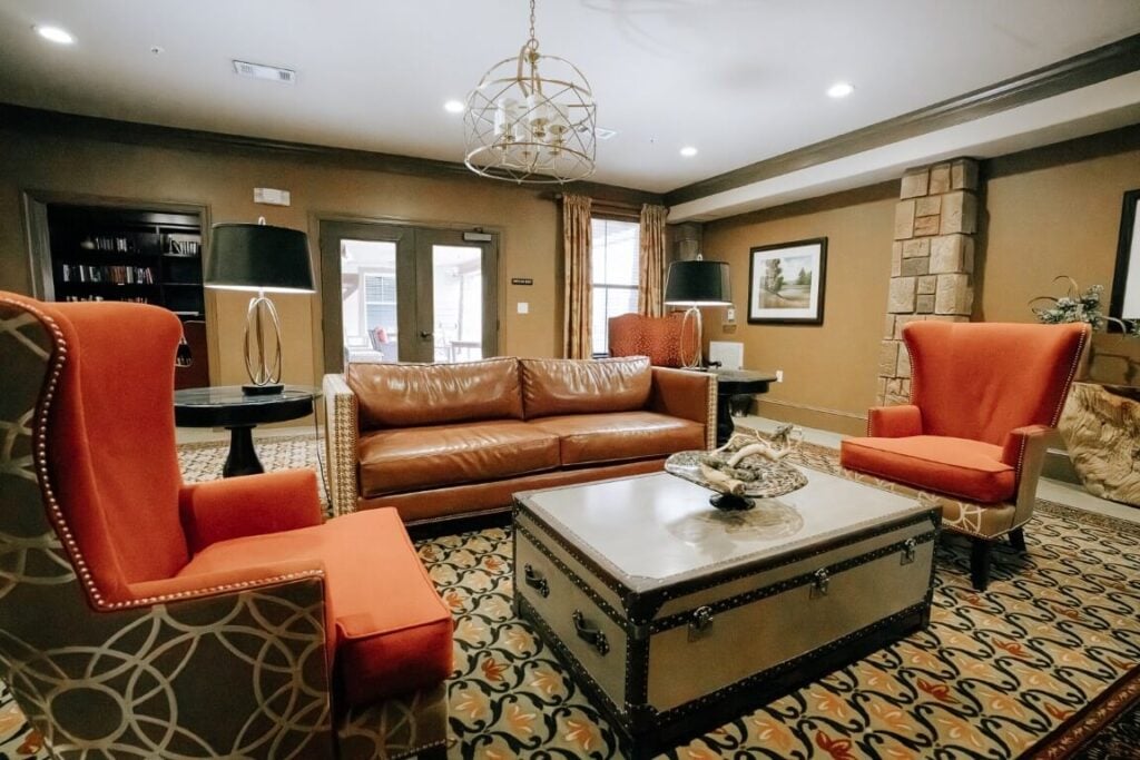 Comfortable Living Room With Fireplace at Skilled Nursing Facility