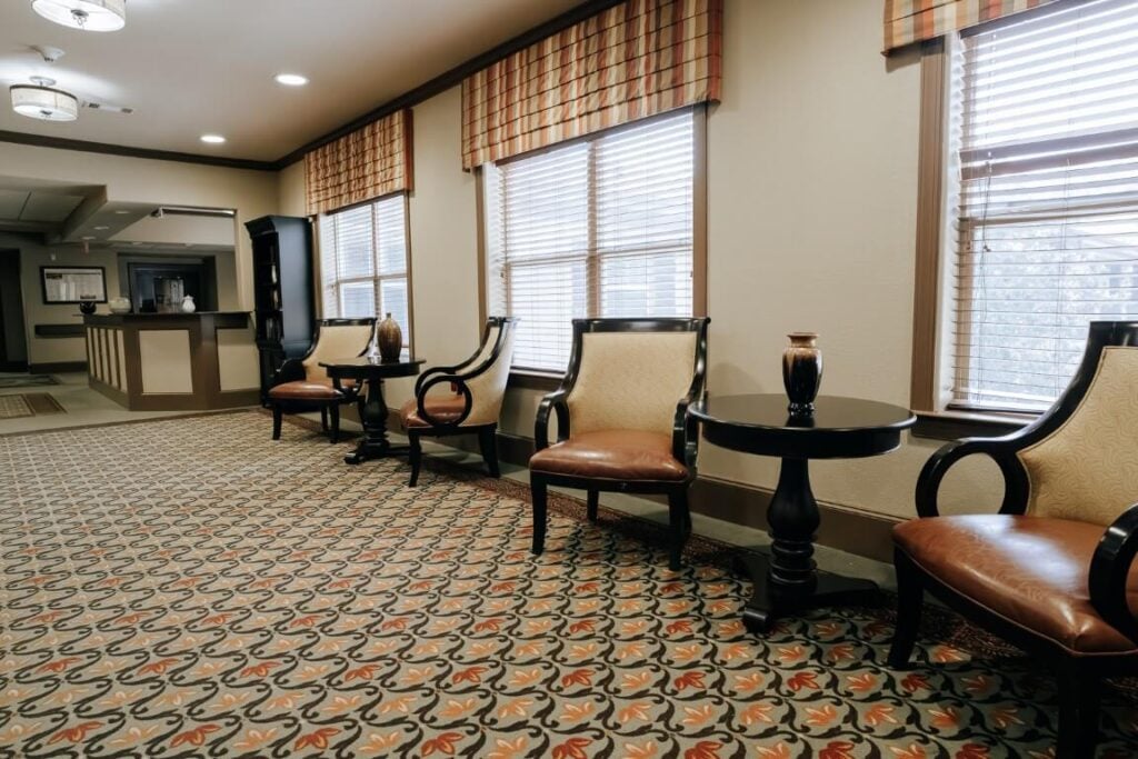 Comfortable Reception Area With Elegant Seating at Assisted Living Facility